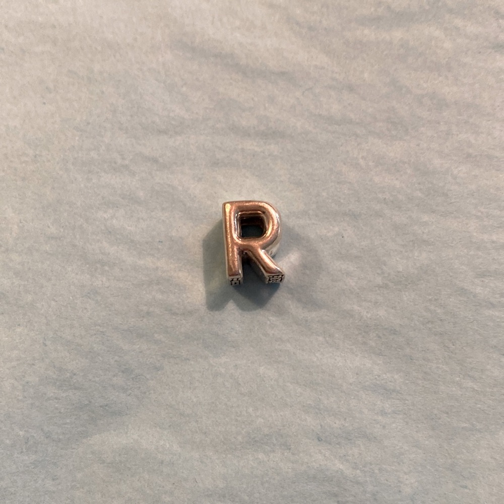 R pandora charm